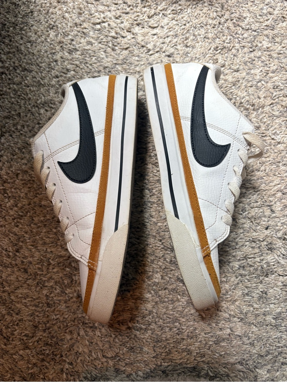 Nike Men’s White Sneakers with Black Swoosh and Tan Stripe